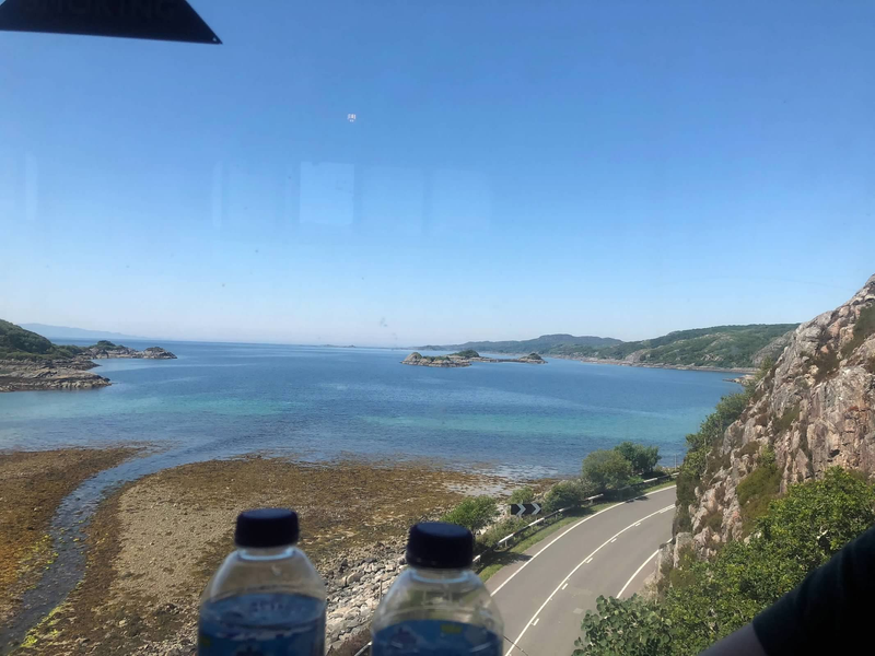 2 bottles and a water view