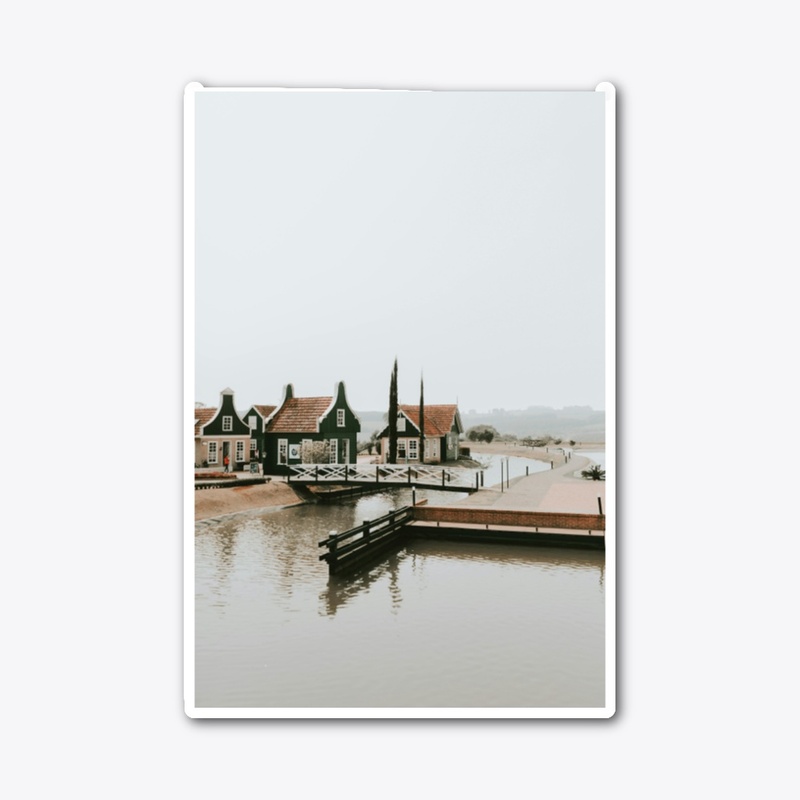 Tranquil Waterfront Village Metal Print