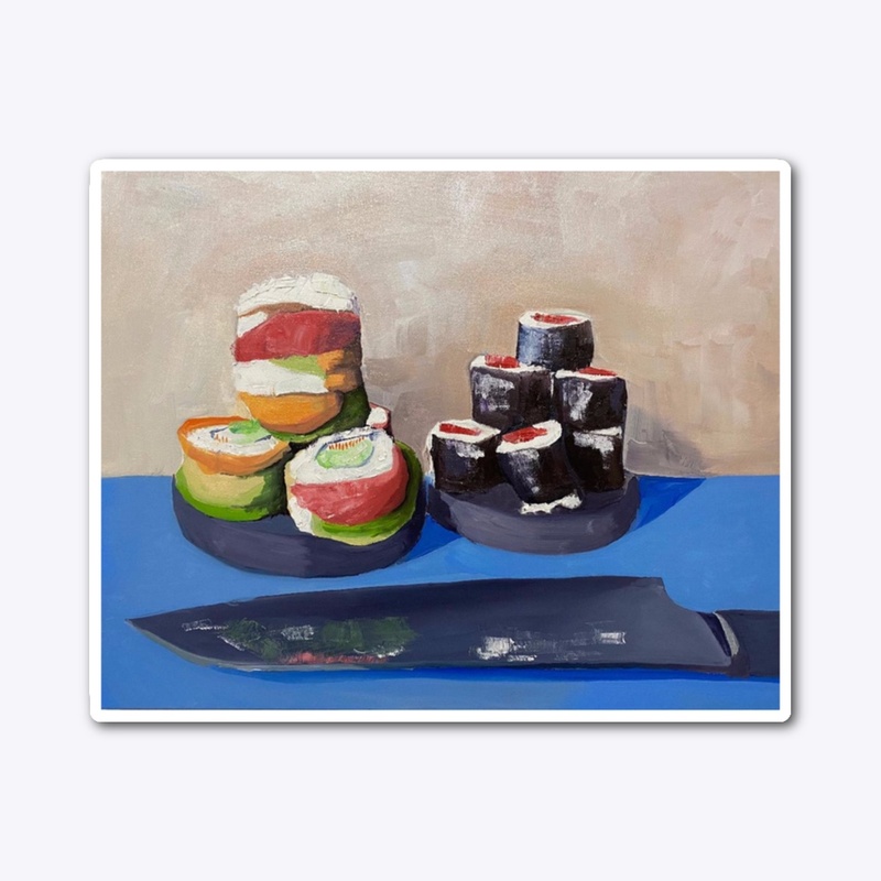 Sushi Atop Blue Table With Knife