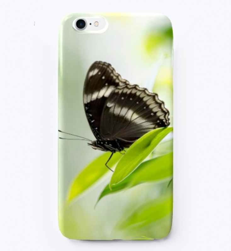 N-115 BLACK BUTTERFLY ON GREEN LEAF