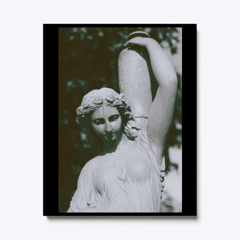 ancient statue of women with vase