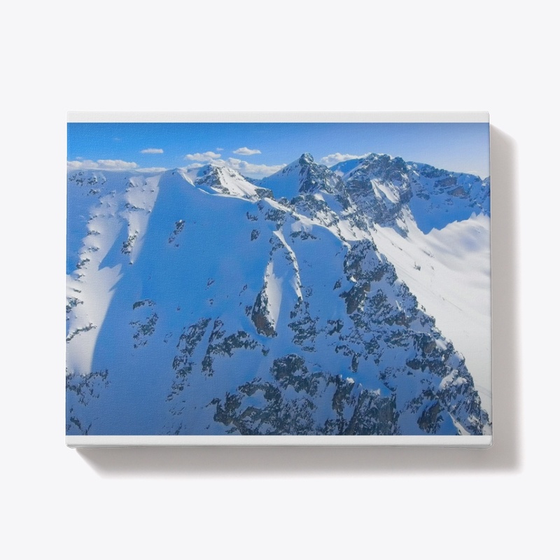 Aerial view of the snow-capped peaks 