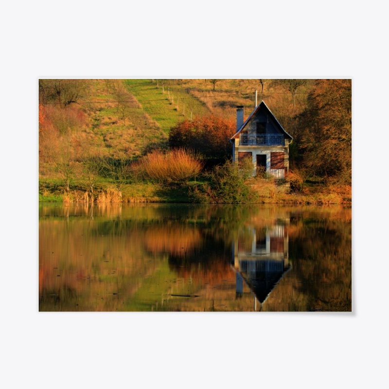 Cottage mirrored in lake