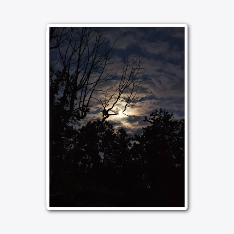 A Beautiful Moon Behind Haunting Clouds