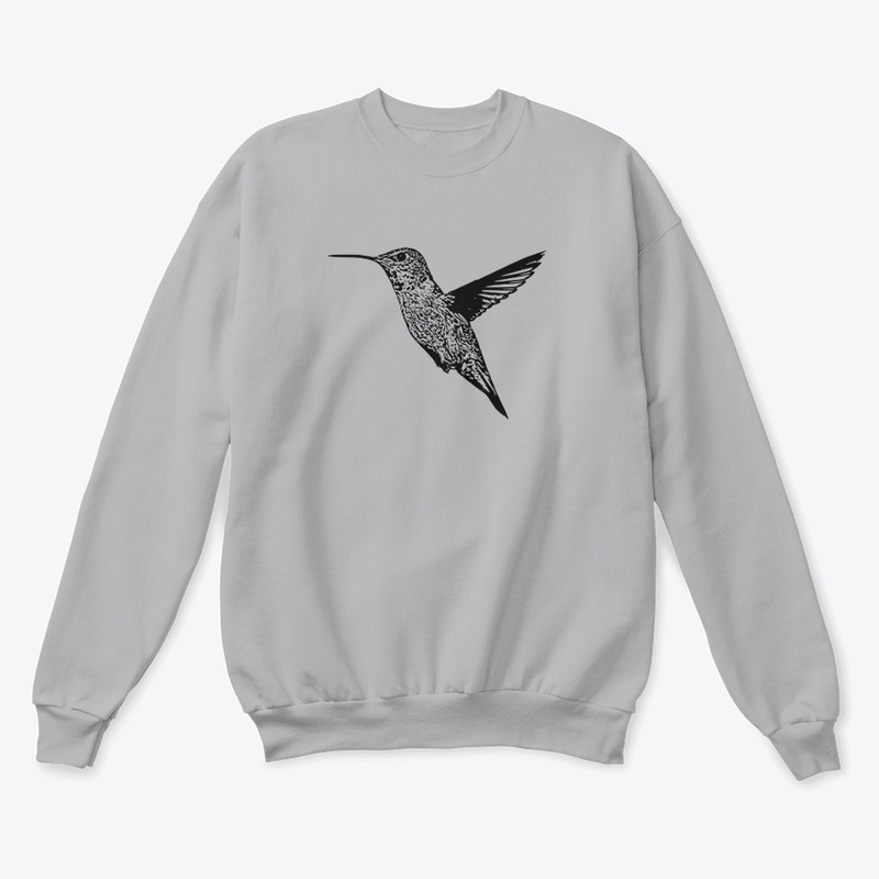 Hummingbird In Flight