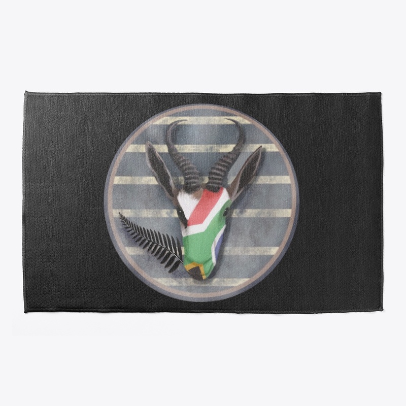 Springbok eating All Black fern