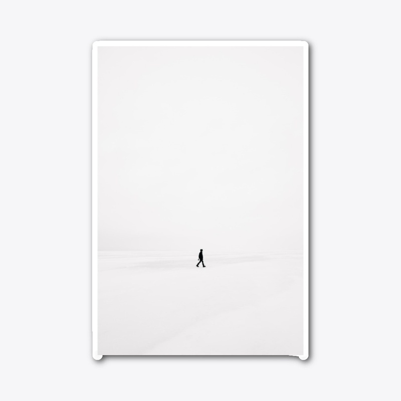 Person Walking on Snowfield
