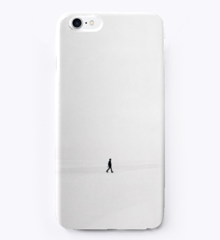 Person Walking on Snowfield