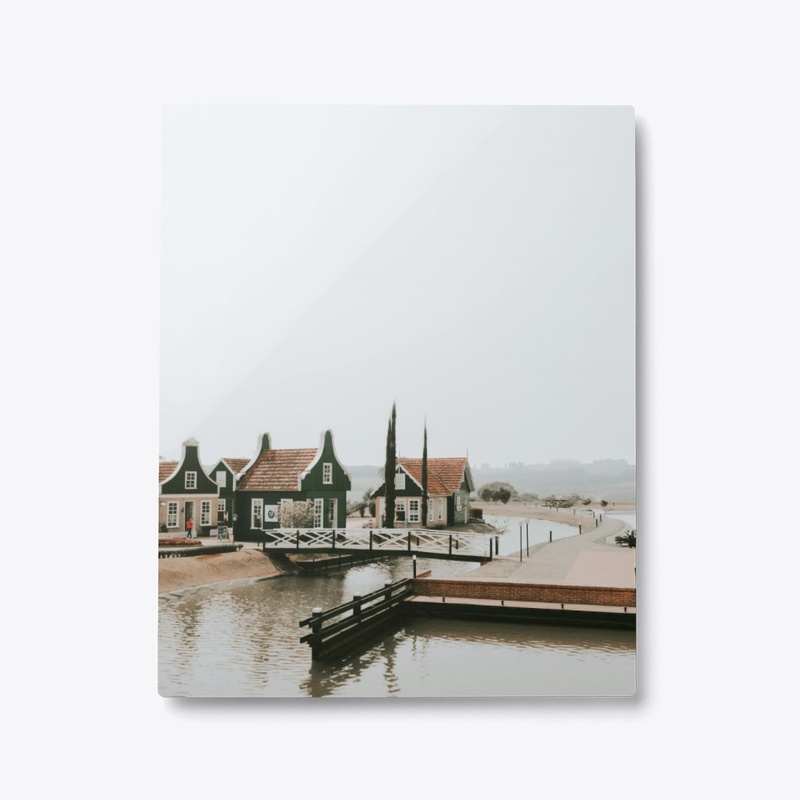 Tranquil Waterfront Village Metal Print