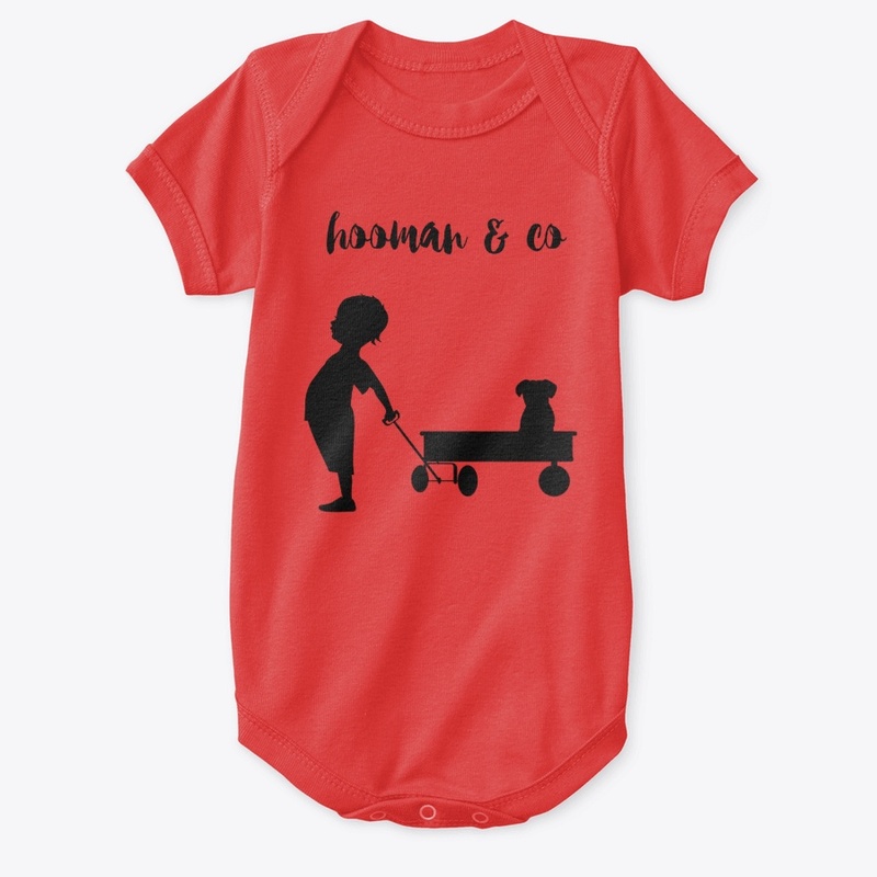 Boy Pulling Puppy in a Cart