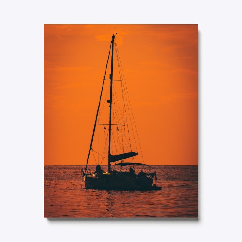 Silhouette of a boat in the golden hour