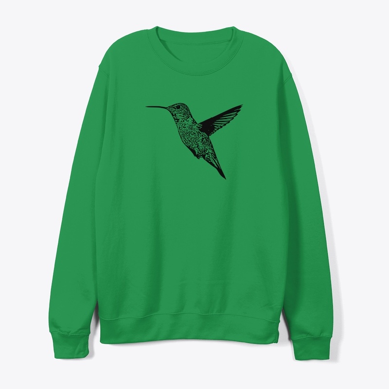 Hummingbird In Flight