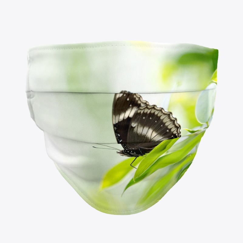 N-115 BLACK BUTTERFLY ON GREEN LEAF