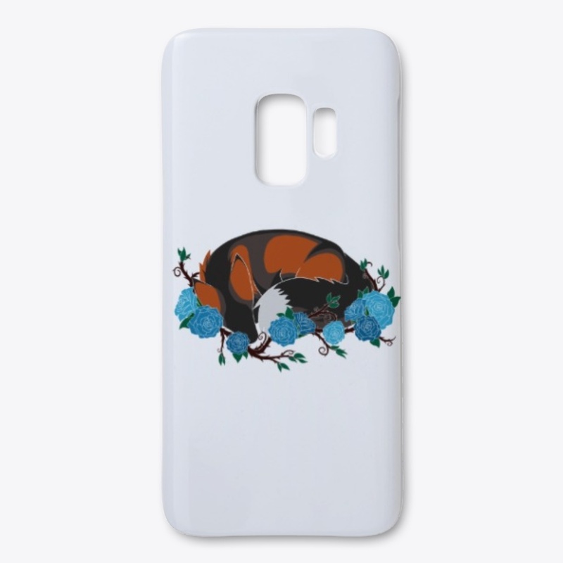 Laying fox with blue roses