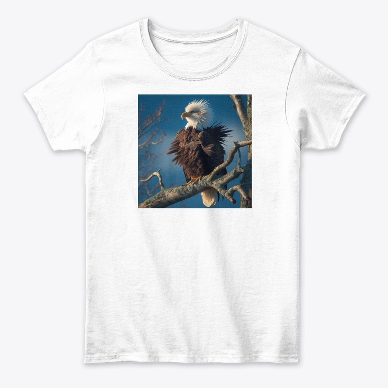 Eagle standing on a tree branch